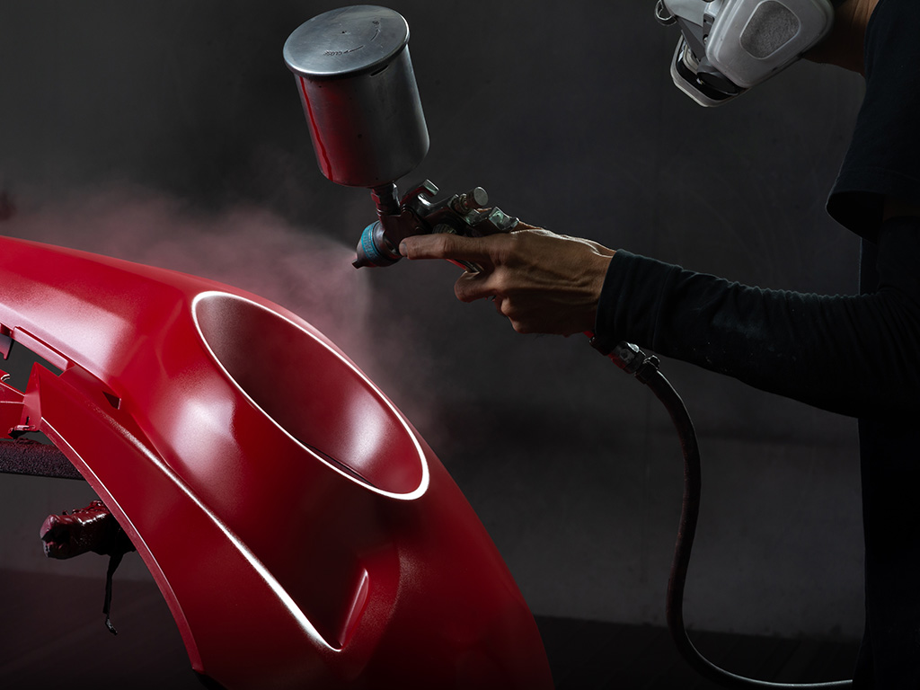 Peinture, giclage professionnel en cabine, carrosserie de Colombier, canton de Neuchâtel