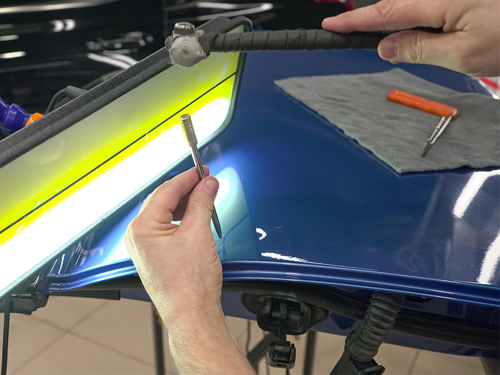 Reparation alternative professionnel, débosselage sans peinture, carrosserie de Colombier, canton de Neuchâtel